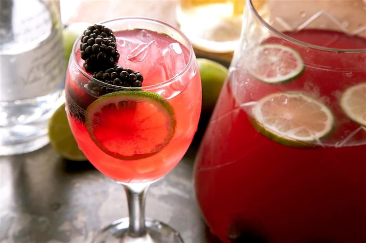 A party isn't a party without some crowd pleasing cocktails. Save your sanity at your next party by having a few of these make-ahead big batch cocktails mixed and ready to serve. Click here to check out these delicious big batch cocktail recipes now.