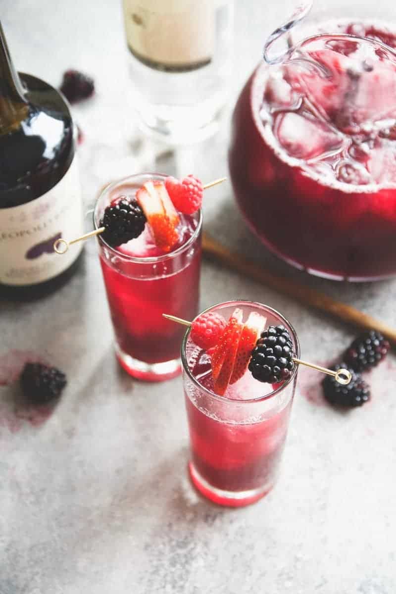 Red-wine-blackberry-ginger-cocktail. A party isn't a party without some crowd pleasing cocktails. Save your sanity at your next party by having a few of these make-ahead big batch cocktails mixed and ready to serve. Click here to check out these delicious big batch cocktail recipes now.