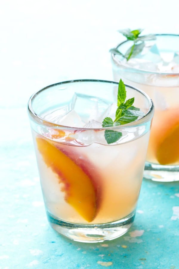 Bourbon-peach-lemonade. A party isn't a party without some crowd pleasing cocktails. Save your sanity at your next party by having a few of these make-ahead big batch cocktails mixed and ready to serve. Click here to check out these delicious big batch cocktail recipes now.