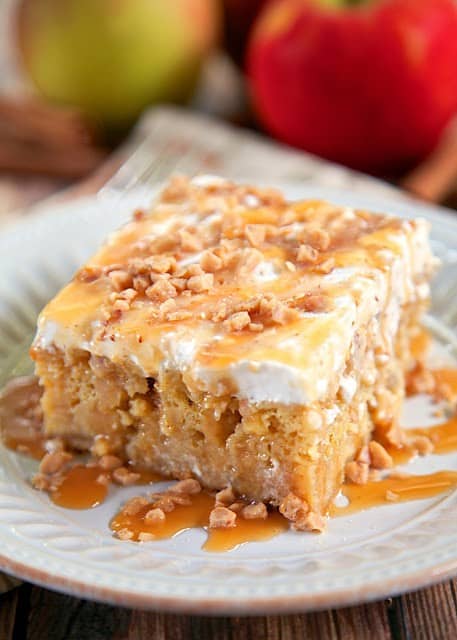 Caramel Apple Poke Cake - These Fall recipes are perfect for the holidays and for any time you want to bring the delicious smells of apple, cinnamon, and pumpkin into your home. You're guaranteed to find a fall flavor you love with these 18 delicious fall dessert recipes.