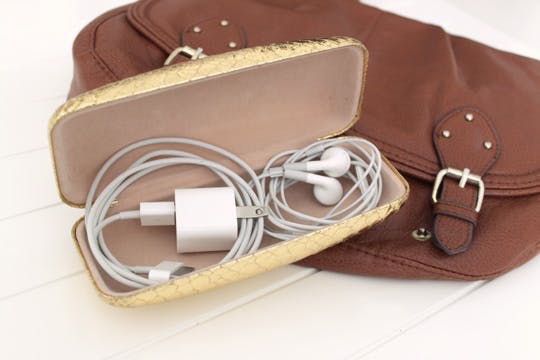 tangle-free cords cables in eyeglasses case - easy travel hack