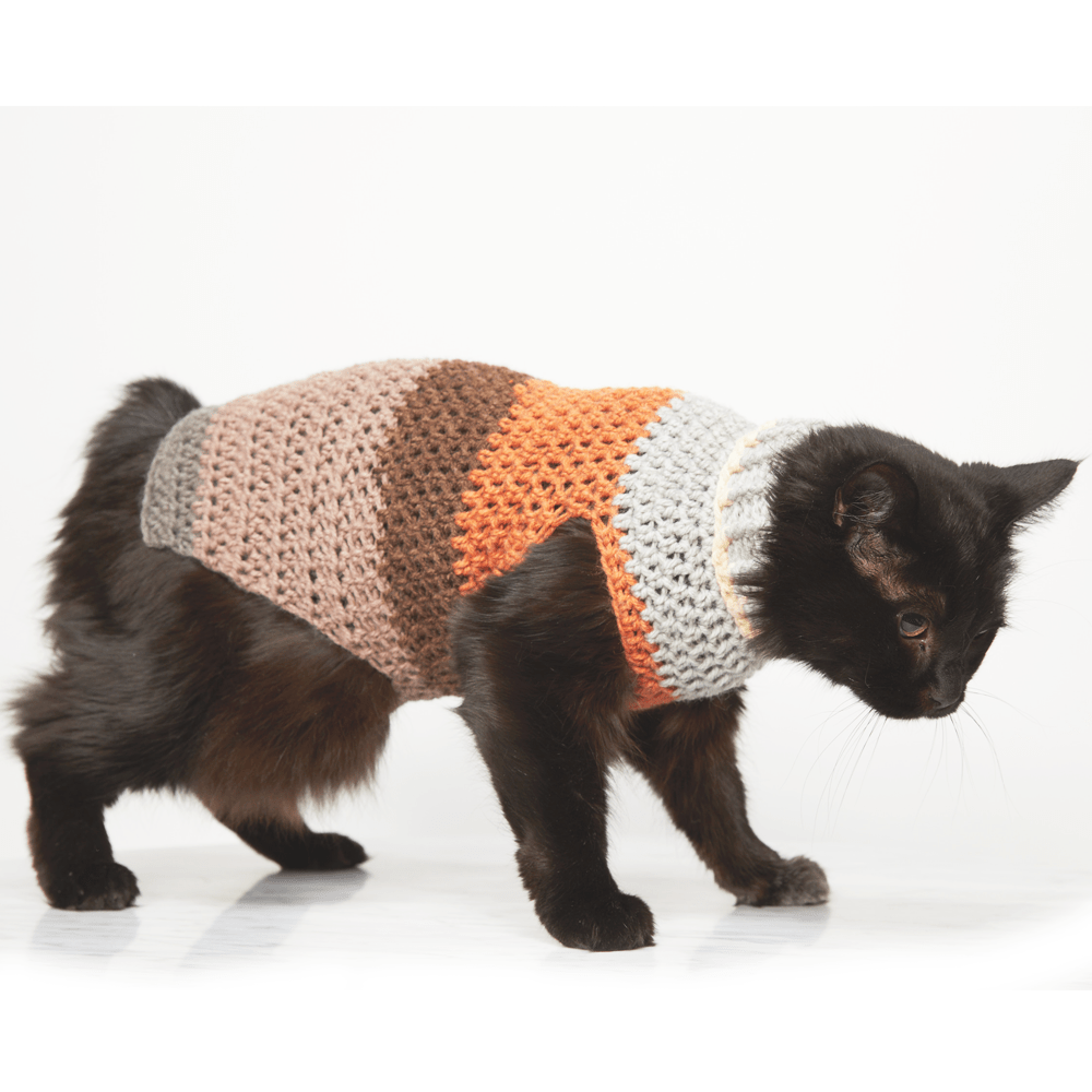 This crochet pet sweater is so cute and has two little holes for your pets front two legs. This free crochet pattern is perfect for beginners. #CrochetPetSweater #CrochetDogSweater #FreeCrchetPattern