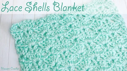 Lace Shells Crochet Baby Blanket - These lace baby blanket patterns are gentle, soft and cozy. Make a special family keepsake with one of these free crochet baby blanket patterns. #BabyBlanketCrochetPatterns #CrochetPatterns #LaceBabyBlanket #CrochetAddict
