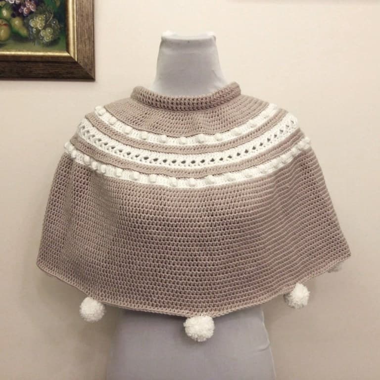 Bella Crochet Poncho - If you want to learn how to make a poncho, this list of 18 free crochet poncho patterns will help you. Pick your favorite from this bunch and start creating. #CrochetPonchoPatterns #FreeCrochetPatterns #CrochetAddict