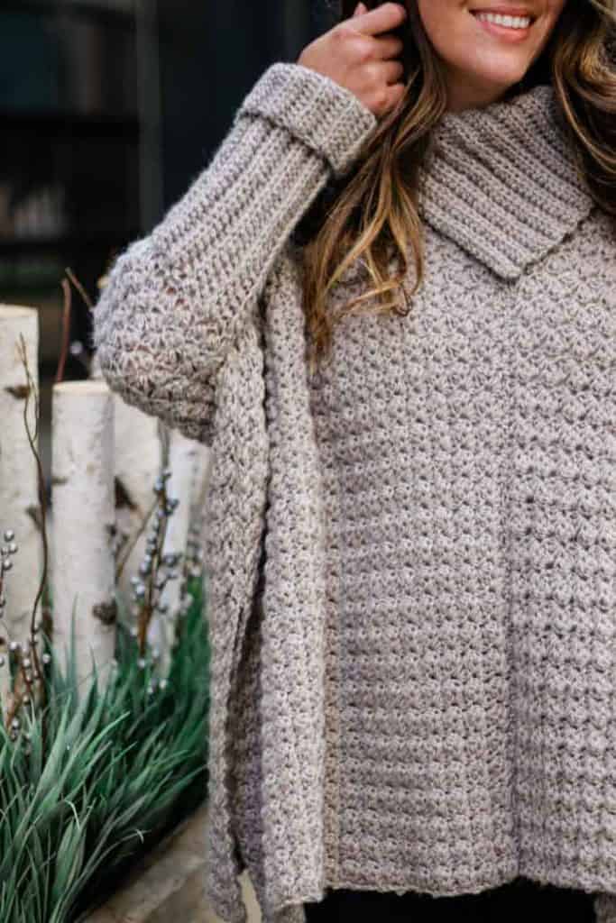 Simple Poncho with Sleeves - If you want to learn how to make a poncho, this list of 18 free crochet poncho patterns will help you. Pick your favorite from this bunch and start creating. #CrochetPonchoPatterns #FreeCrochetPatterns #CrochetAddict