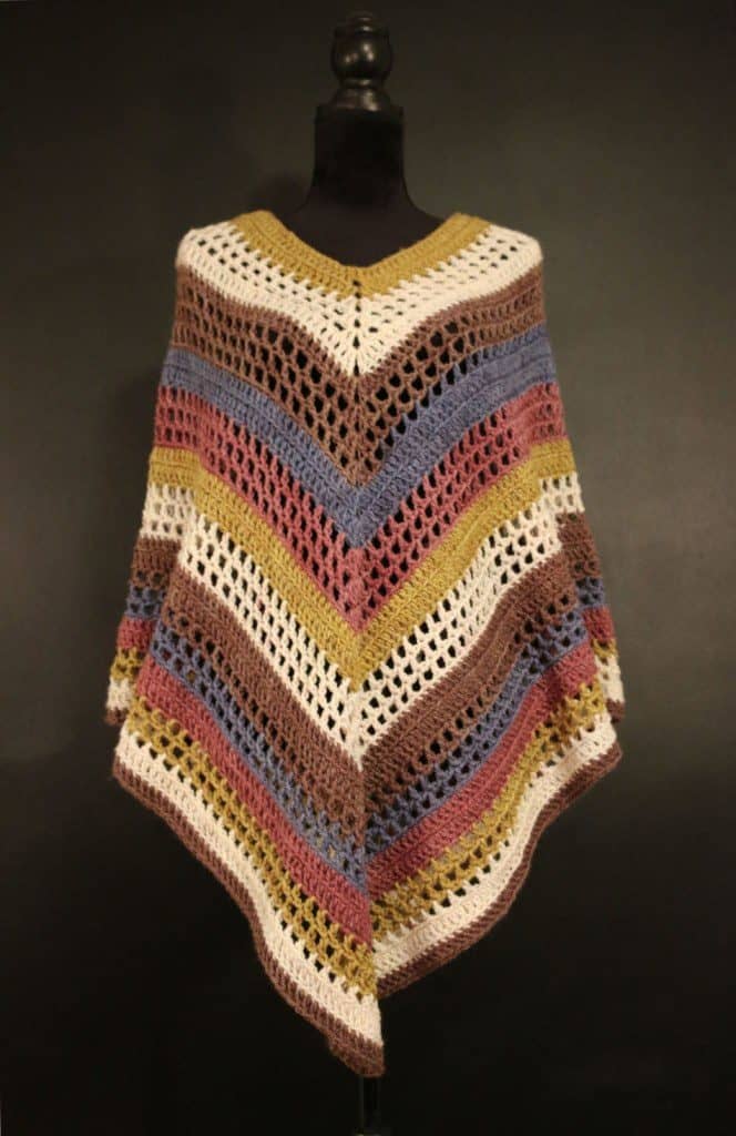 The Easiest Poncho You'll Ever Make - If you want to learn how to make a poncho, this list of 18 free crochet poncho patterns will help you. Pick your favorite from this bunch and start creating. #CrochetPonchoPatterns #FreeCrochetPatterns #CrochetAddict