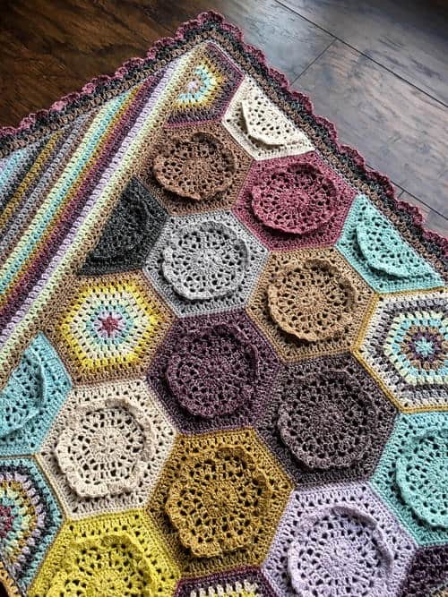 Dutch Rose Blanket - Crochet afghans are colorful and exciting and full of life. There’s so much room for creativity in these crochet blanket patterns. #CrochetAfghans #CrochetPatterns #CrochetBlankets