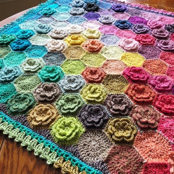 Happy Little Tree Blanket - Crochet afghans are colorful and exciting and full of life. There’s so much room for creativity in these crochet blanket patterns. #CrochetAfghans #CrochetPatterns #CrochetBlankets
