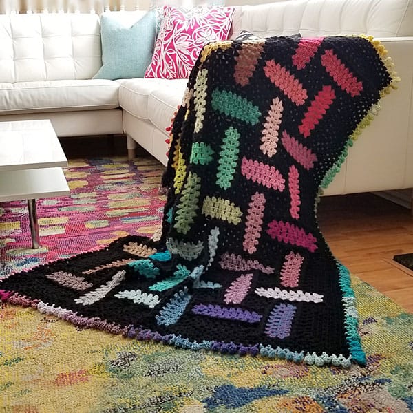 Wondrous Warp and Weft Blanket - Crochet afghans are colorful and exciting and full of life. There’s so much room for creativity in these crochet blanket patterns. #CrochetAfghans #CrochetPatterns #CrochetBlankets