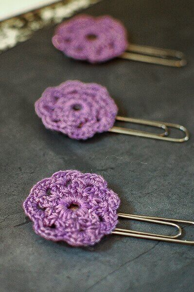 Crochet Flower Paper Clip Toppers - Learn how to crochet a flower and bring the magic of nature into your life with these crochet patterns.  Each one is unique and colorful. #CrochetFlowerPatterns #CrochetPatterns #FreeCrochetPatterns