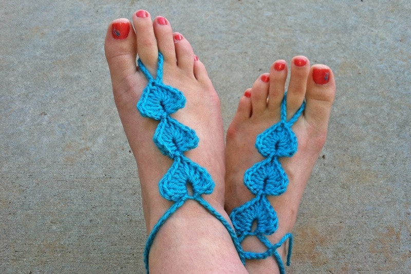 Hearts Barefoot Sandals - These crochet sandals and barefoot sandals are the perfect summer crochet projects. These crochet patterns take just a little bit of yarn. #CrochetSandals #CrochetPatterns #CrochetSandalPatterns