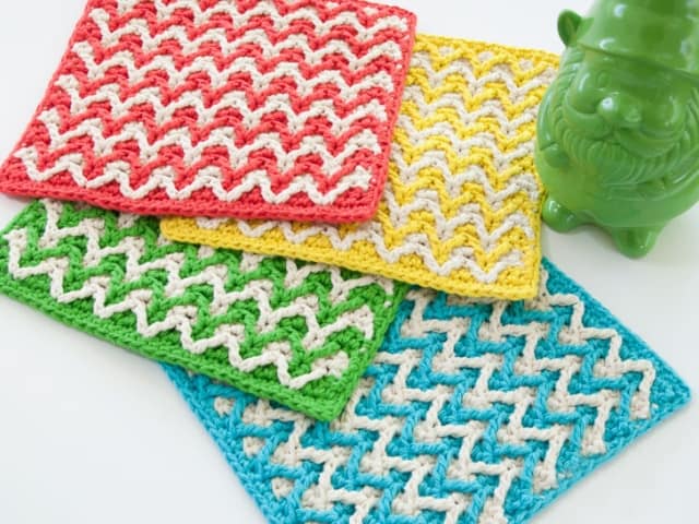 Bright Chevron Dishcloth - These crochet dishcloth patterns are all free and are so different from each other. Test your creativity with one of these brilliant dishcloth patterns. #CrochetDishclothPatterns #CrochetPatterns #DishclothPatterns