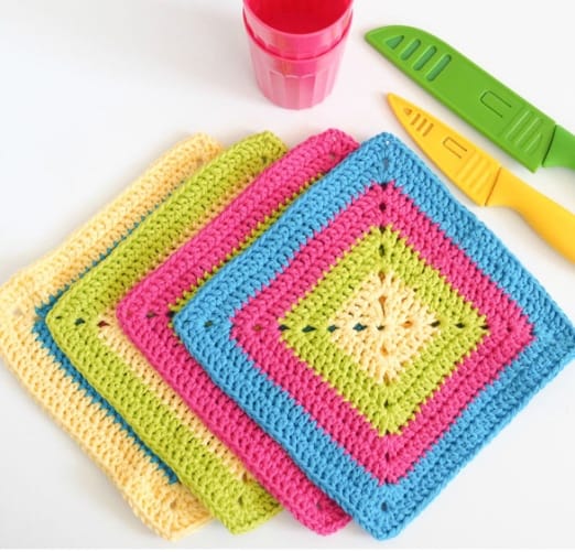 Colorful Solid Granny Square Dishcloth - These crochet dishcloth patterns are all free and are so different from each other. Test your creativity with one of these brilliant dishcloth patterns. #CrochetDishclothPatterns #CrochetPatterns #DishclothPatterns