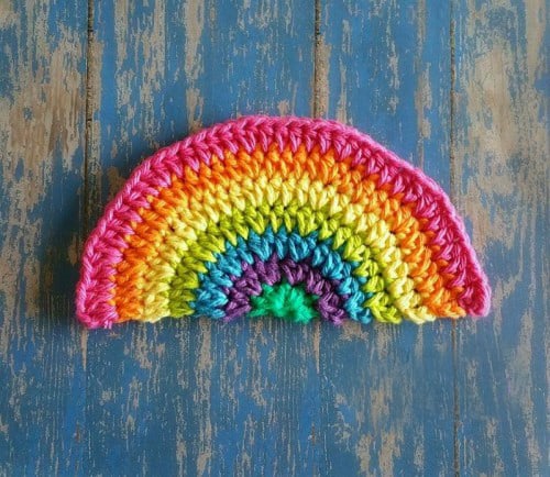 Rainbow Daze Dishcloth - These crochet dishcloth patterns are all free and are so different from each other. Test your creativity with one of these brilliant dishcloth patterns. #CrochetDishclothPatterns #CrochetPatterns #DishclothPatterns