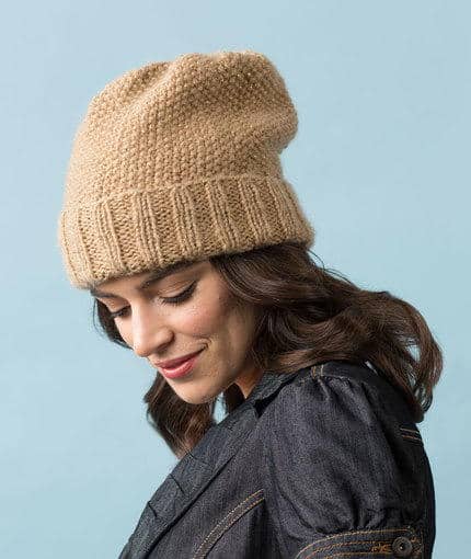 Camel Seed Stitch Slouchy Hat - These 23 easy knitting patterns for hats are a perfect starting place for beginners, and they’re fun to do for even seasoned knitters. #knittingpatterns #knithatpatterns