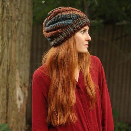 Flat Knit Swirl Hat - These 23 easy knitting patterns for hats are a perfect starting place for beginners, and they’re fun to do for even seasoned knitters. #knittingpatterns #knithatpatterns