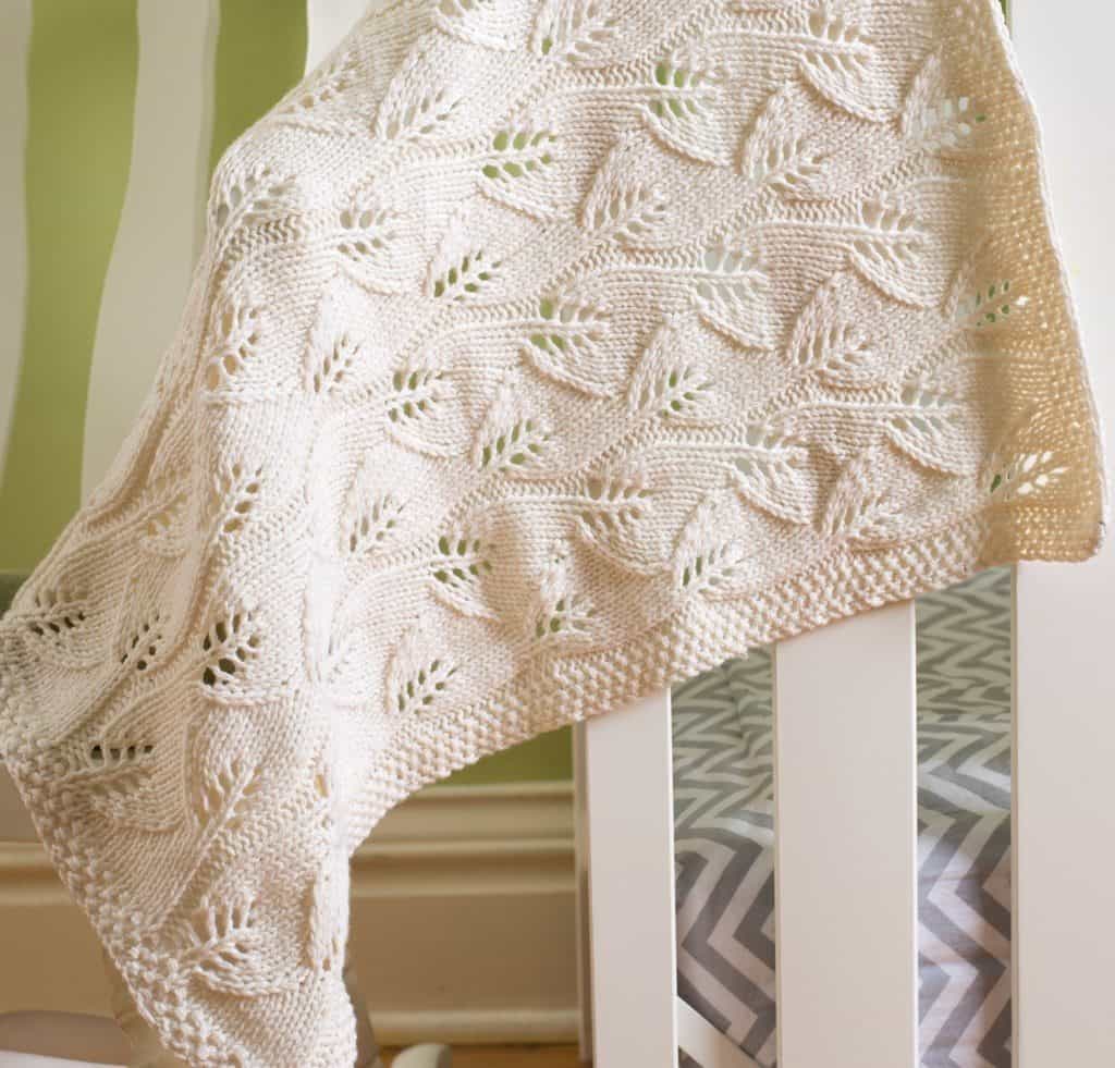 Leafy Baby Blanket - These knitting patterns for baby blankets are easy and adorable you might find yourself making more than just one! #knittingpatterns #babyblanketknittingpatterns #babyblankets