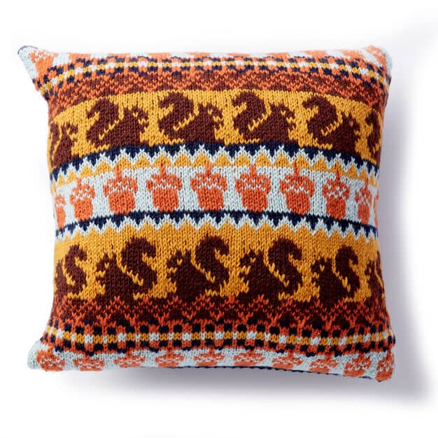 Patons Autumn Harvest Knit Pillow - We’ve got 16 quick and easy Thanksgiving knitting patterns for anything from hats, to centerpiece decorations. #knittingpatterns #thanksgivingknittingpatterns #freeknittingpatterns