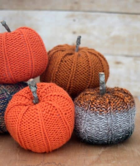 Scrap Yarn Pumpkin - We’ve got 16 quick and easy Thanksgiving knitting patterns for anything from hats, to centerpiece decorations. #knittingpatterns #thanksgivingknittingpatterns #freeknittingpatterns