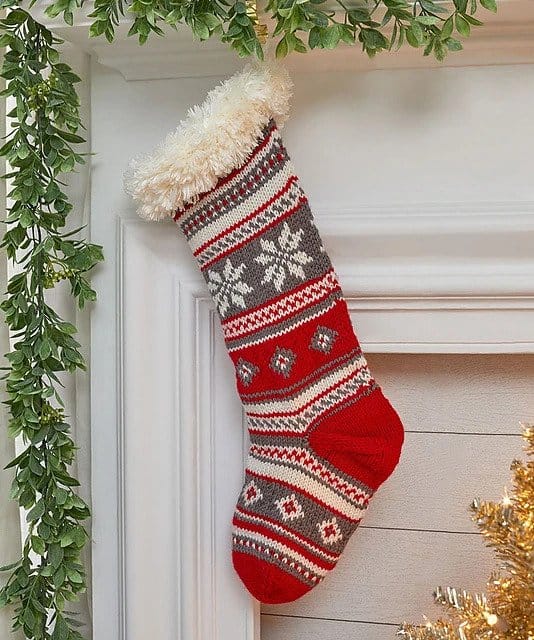 Festive Fair Isle Knit Stocking - Explore these 11 free Fair Isle holiday knit patterns that will turn your knit projects from ordinary to holiday ready!  #fairisleknit #holidayknits