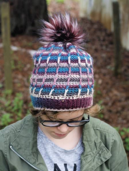 Perpetual Posts Hat - These 26 crochet winter hat patterns are perfect to create a winter hat accessory that you love and can rely on. #crochetwinterhat #crochetpatterns #crochethatpatterns