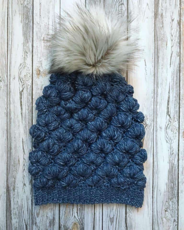 The Trident Puff Beanie - These 26 crochet winter hat patterns are perfect to create a winter hat accessory that you love and can rely on. #crochetwinterhat #crochetpatterns #crochethatpatterns