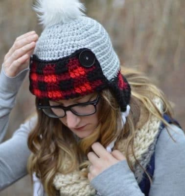 Women’s Crochet Plaid Trapper Hat - These 26 crochet winter hat patterns are perfect to create a winter hat accessory that you love and can rely on. #crochetwinterhat #crochetpatterns #crochethatpatterns