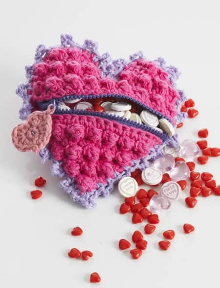 Sweet Tooth Candy Bag - Check out this list of ‘love’-ly easy crochet projects you can do for the ones you love. These range from easy trinkets, wreaths and blankets. #EasyCrochetProjects #CrochetPatterns #ValentineCrochetPatterns