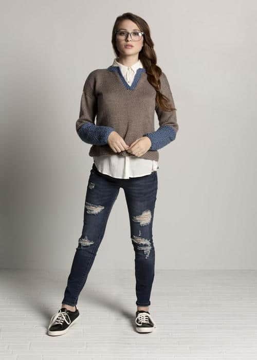 Henley Knit Sweater - Keep yourself warm and comfy this season by knitting one of these knitted sweater patterns. You can choose from the basic pullover to a more daring design. #knittedsweaterpatterns #knittingpatterns #knitsweaterpatterns