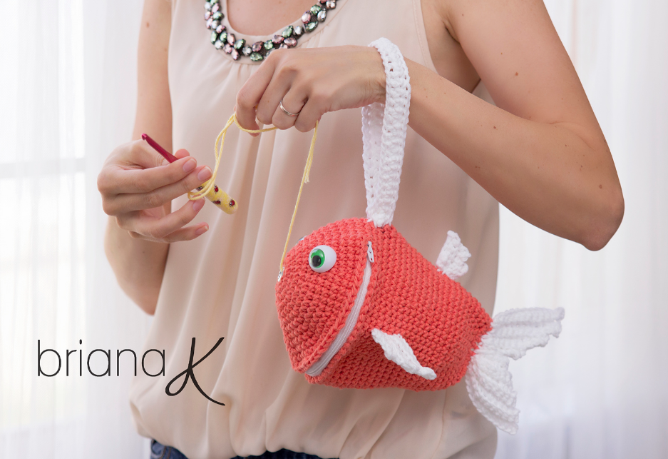a woman holding the Fish Crochet Bag