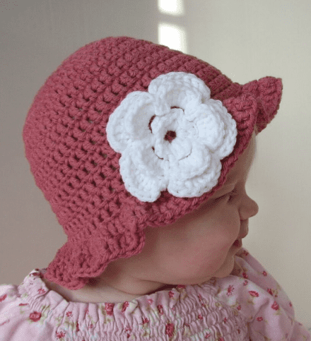 A baby wearing a Floppy Brim Crochet Sun Hat